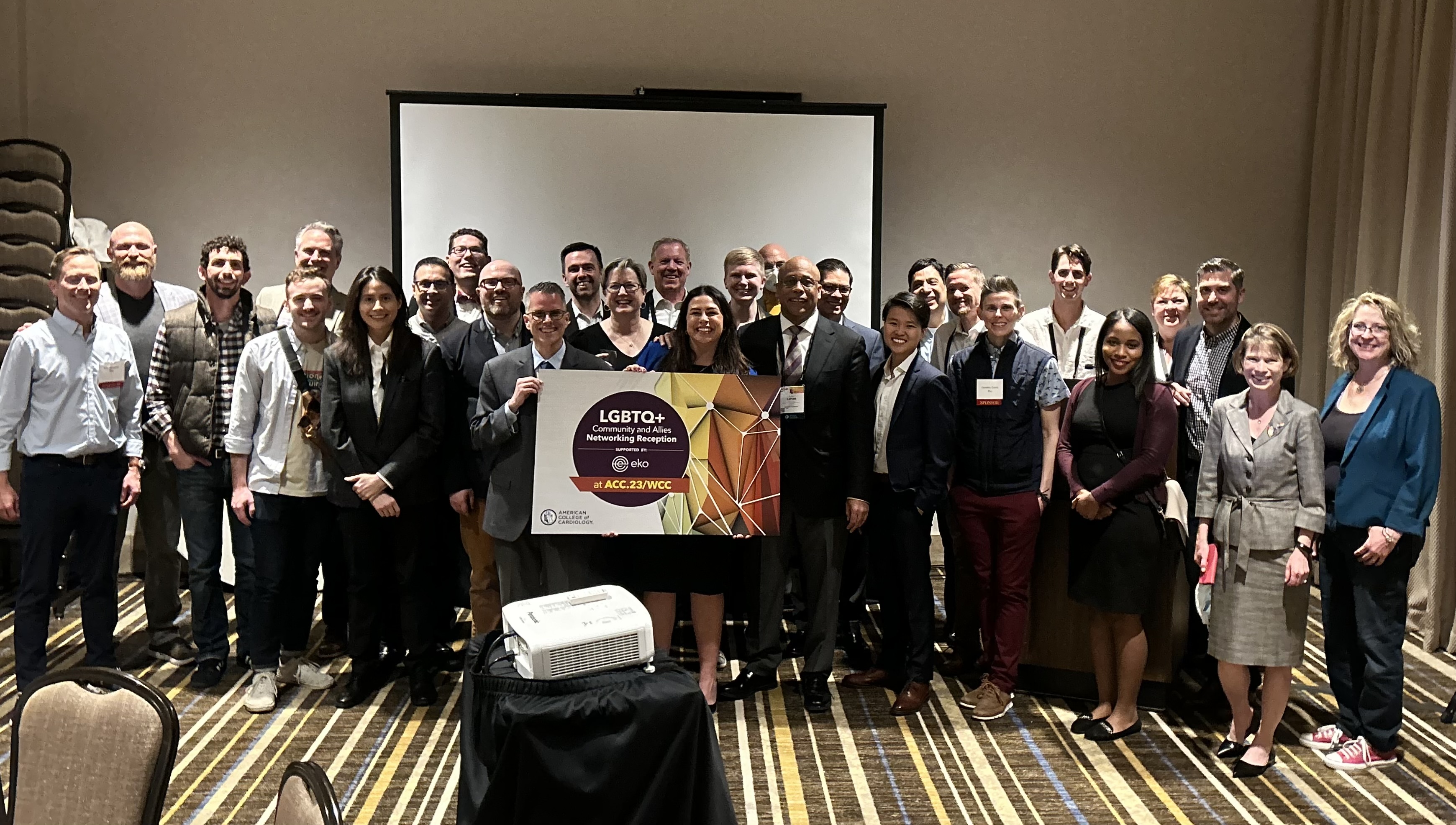 Group photo of the LGBTQ+ Work Group members at the LGBTQ+ Networking Reception at ACC.23.